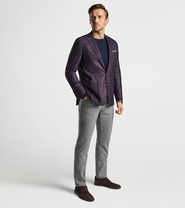 Man in merlot sport coat over navy sweater